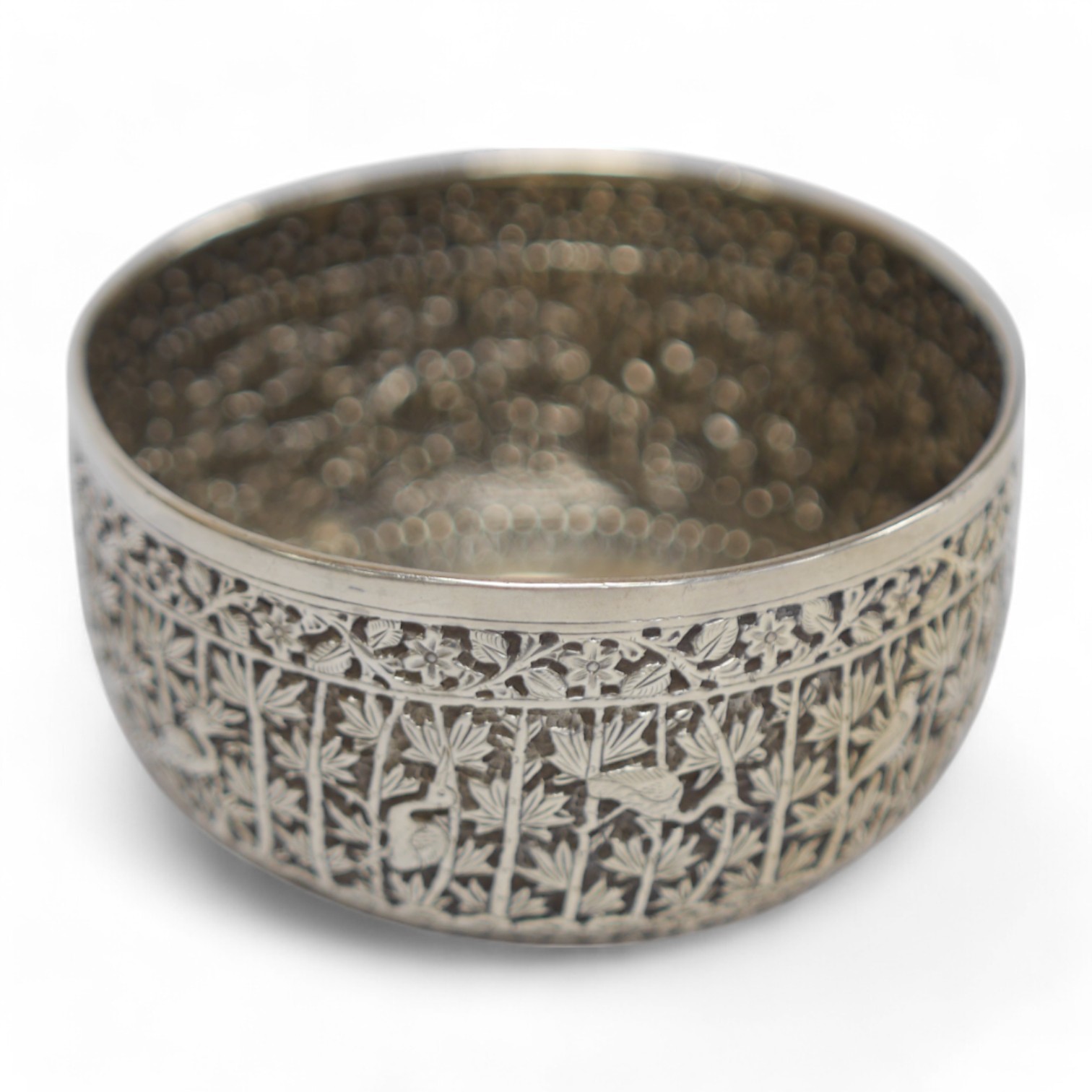 A late Victorian Scottish embossed silver bowl, in the Burmese style, David & George Edwards, Glasgow, 1893, diameter 11.2cm, 4.8oz. Condition - poor to fair